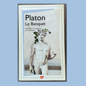 Couverture du livre Le Banquet de Platon avec statue masculine ornée de fleurs